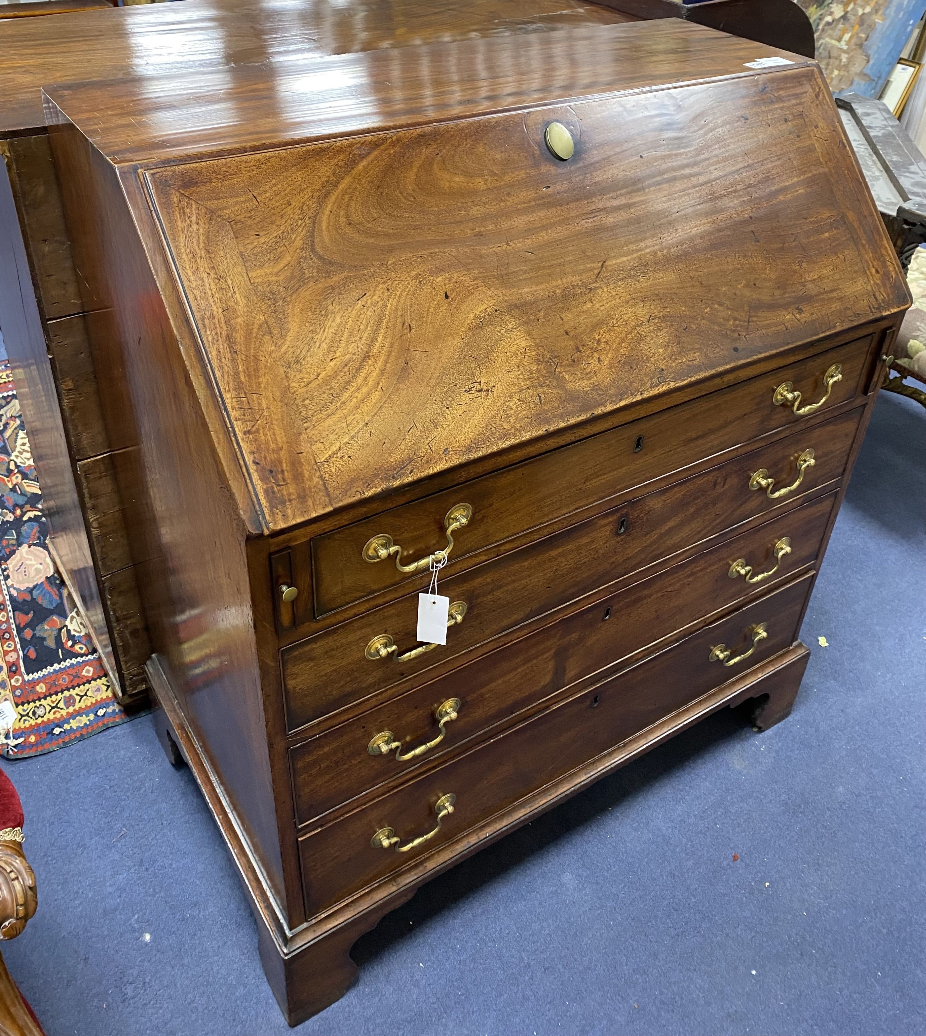 A George III mahogany bureau, width 92cm, depth 52cm, height 106cm